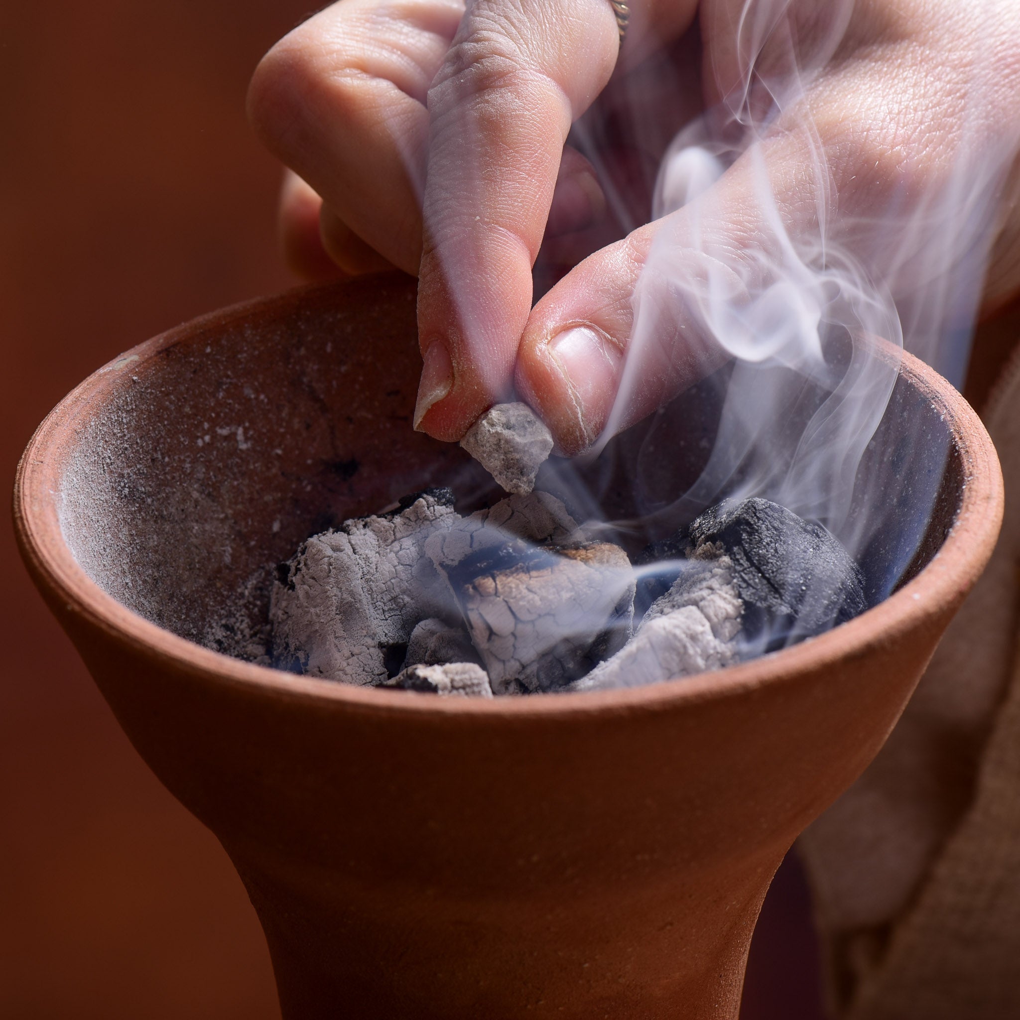 Black Copal Iquitos burning on charcoal